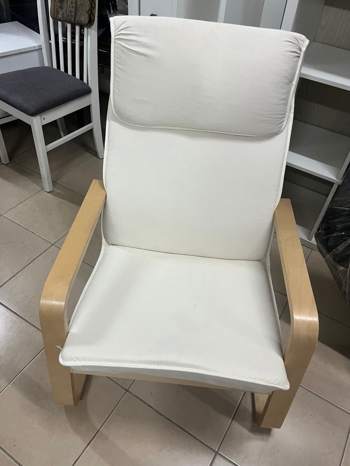 Chair - from IKEA with a natural wood frame and beige cushion - Image 7
