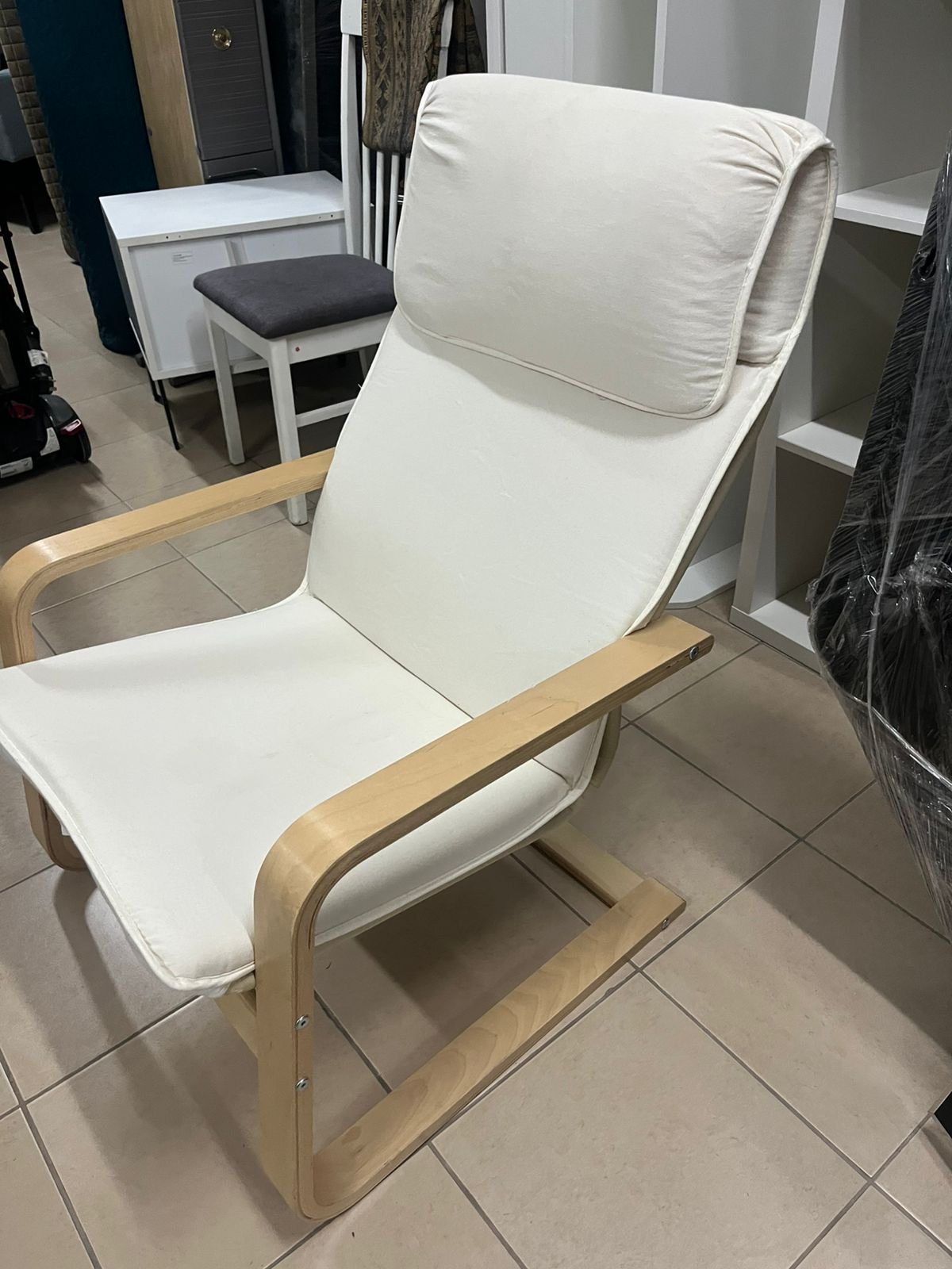 Chair - from IKEA with a natural wood frame and beige cushion - Image 8