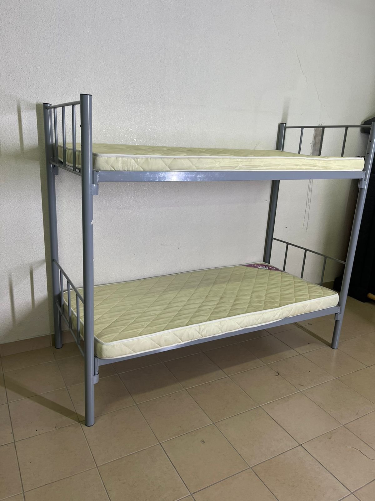 Metal bunk bed in gray