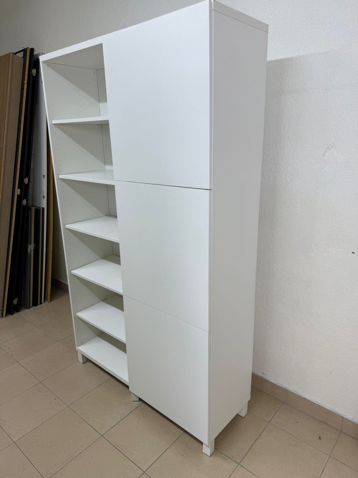 A white storage cabinet from IKEA, model BESTÅ, comes with open units and closed fronts. - Image 9