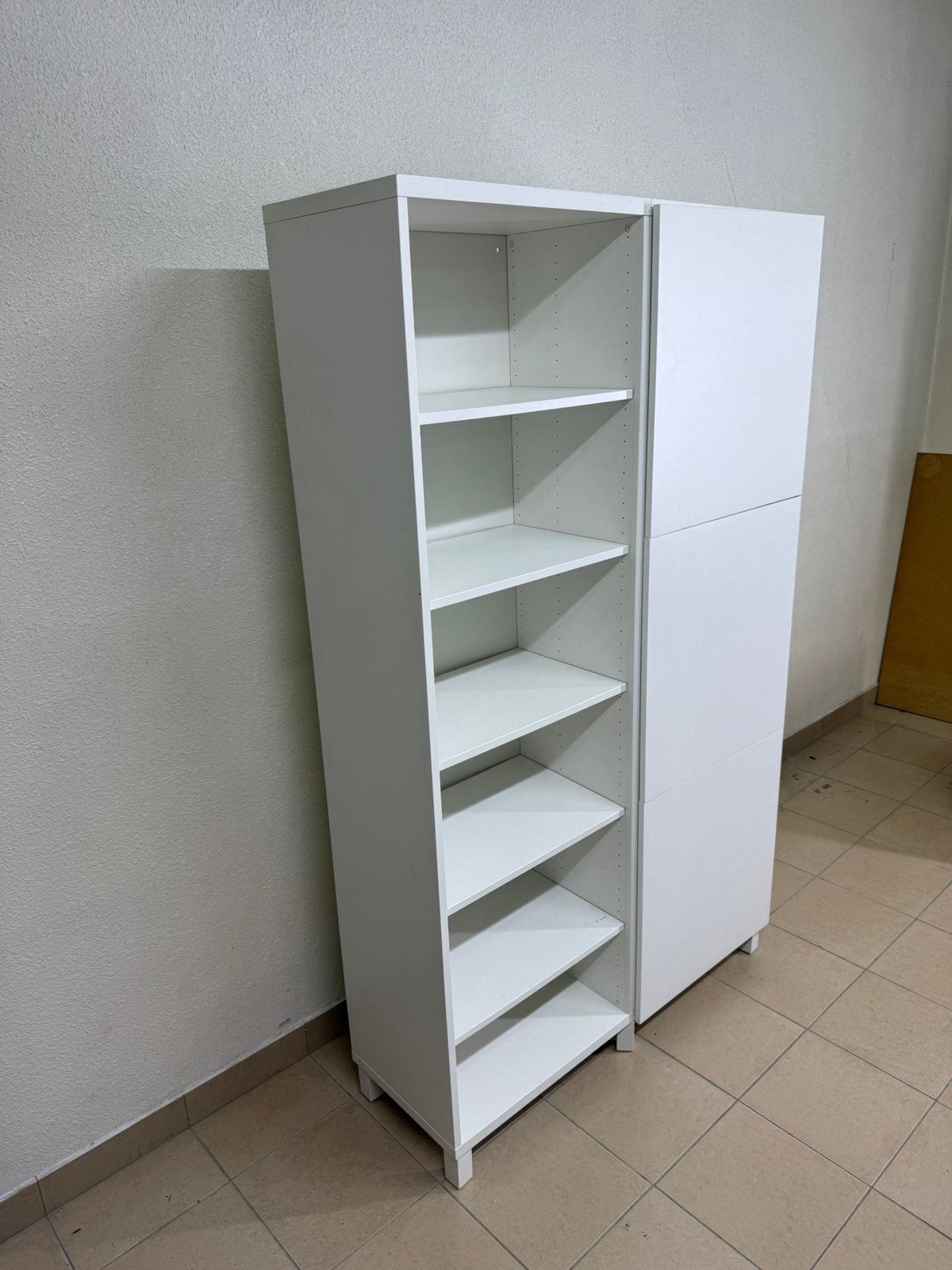 A white storage cabinet from IKEA, model BESTÅ, comes with open units and closed fronts. - Image 11