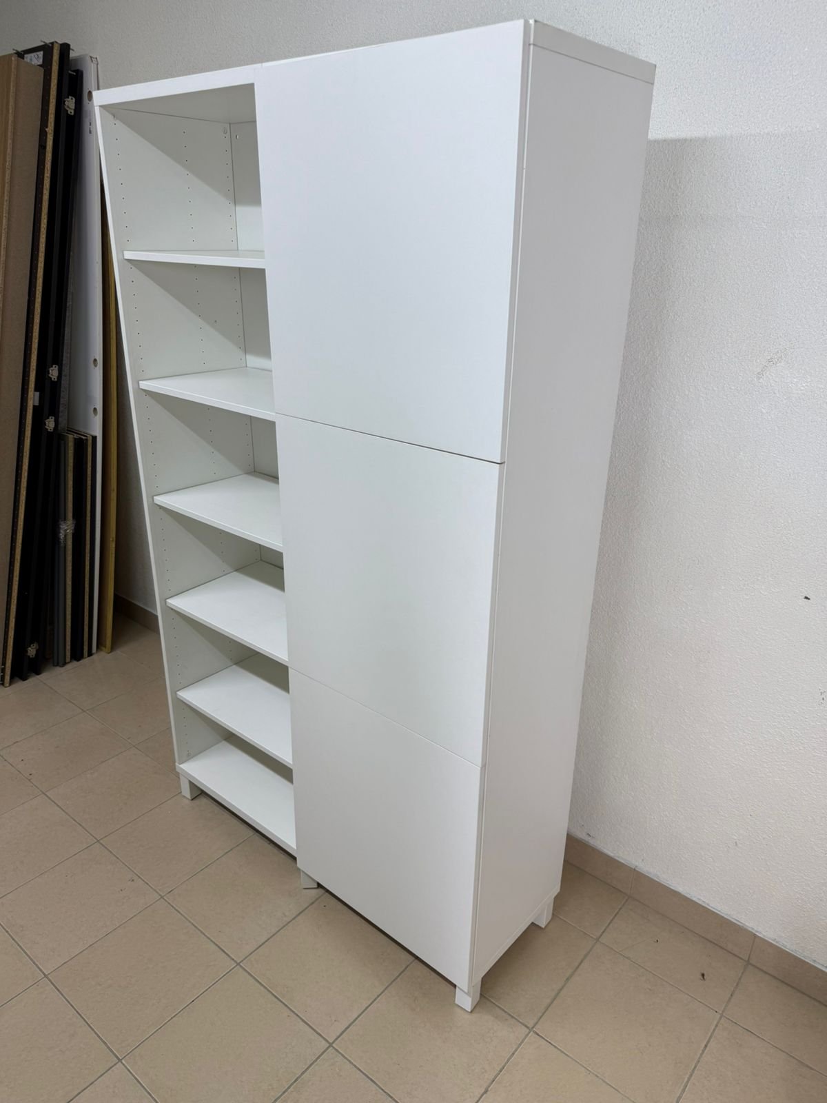 A white storage cabinet from IKEA, model BESTÅ, comes with open units and closed fronts. - Image 13