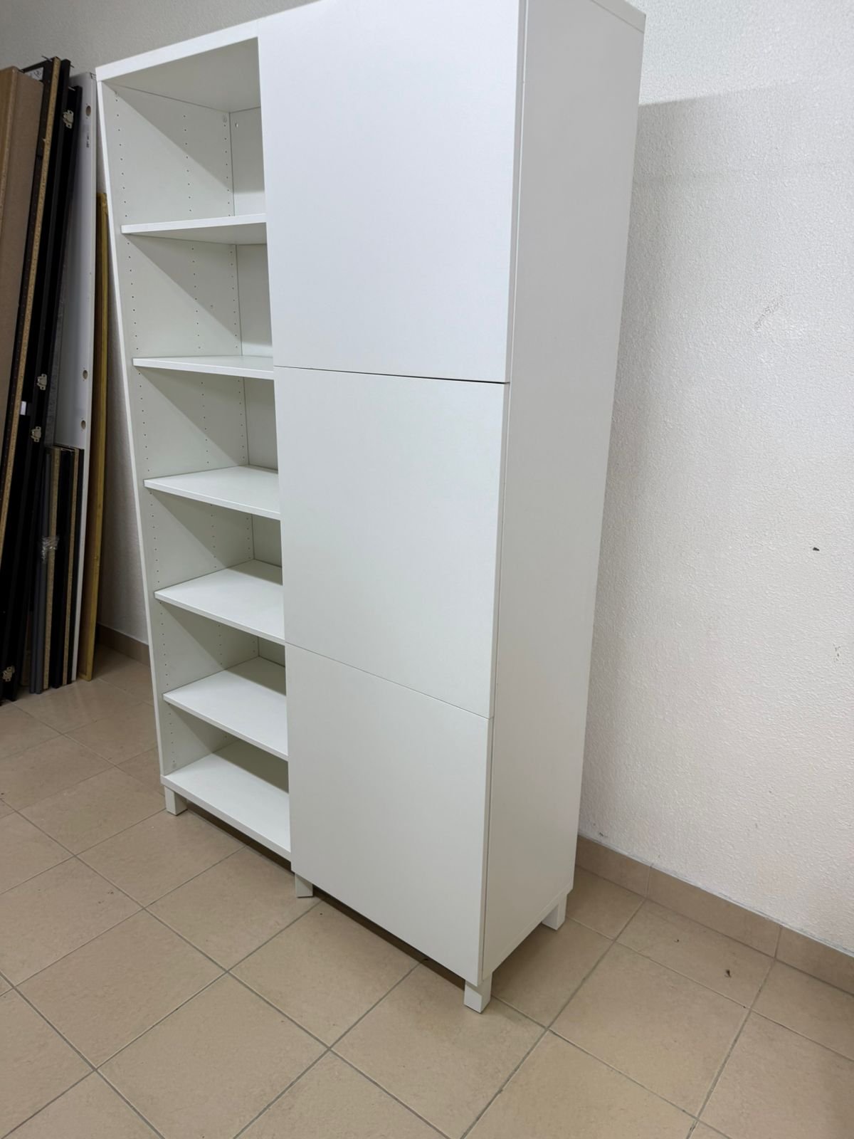 A white storage cabinet from IKEA, model BESTÅ, comes with open units and closed fronts. - Image 14