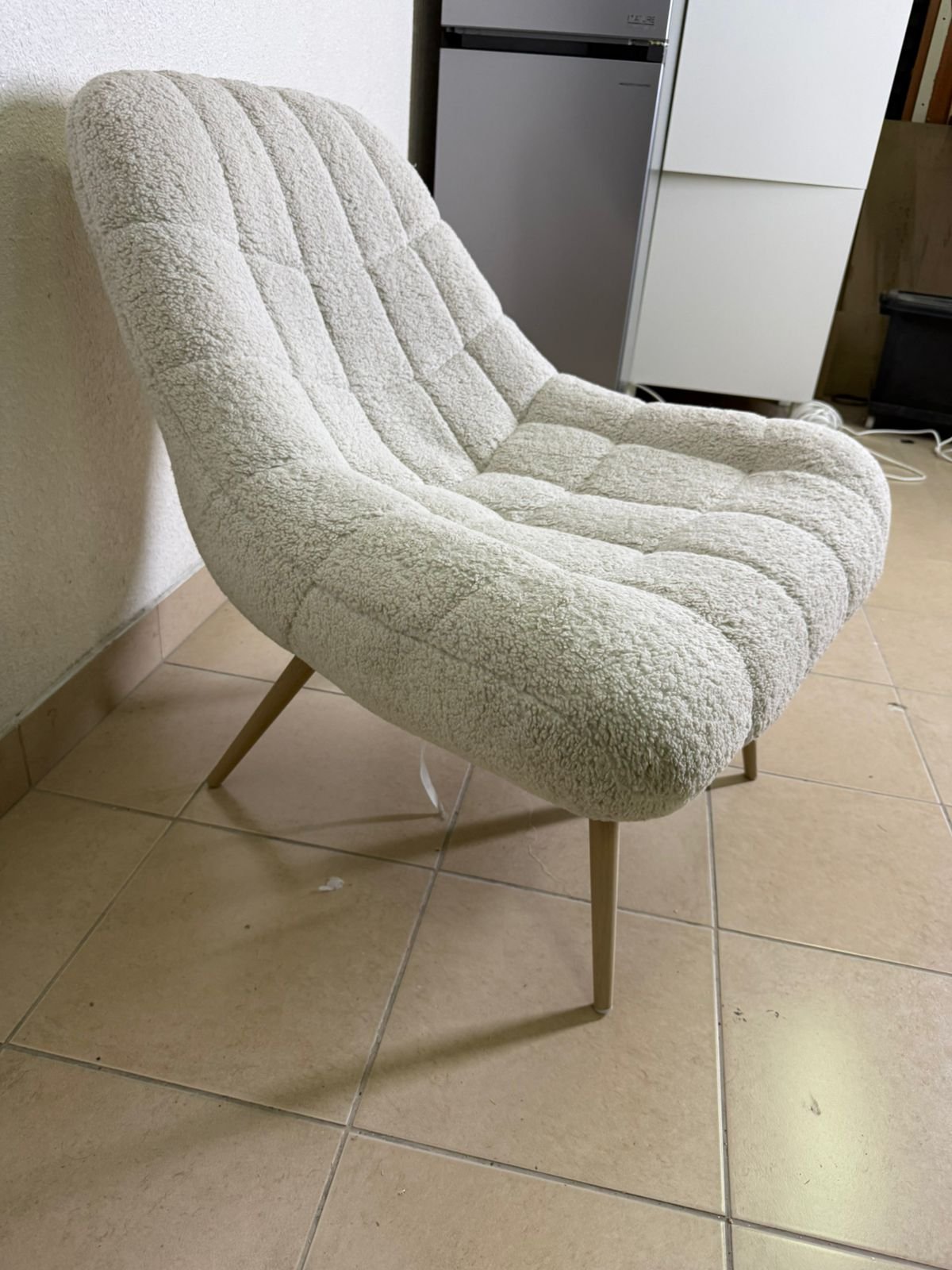 The chair is the Aubrey stool in cream, upholstered in Boucle fabric by Ashcroft. - Image 3