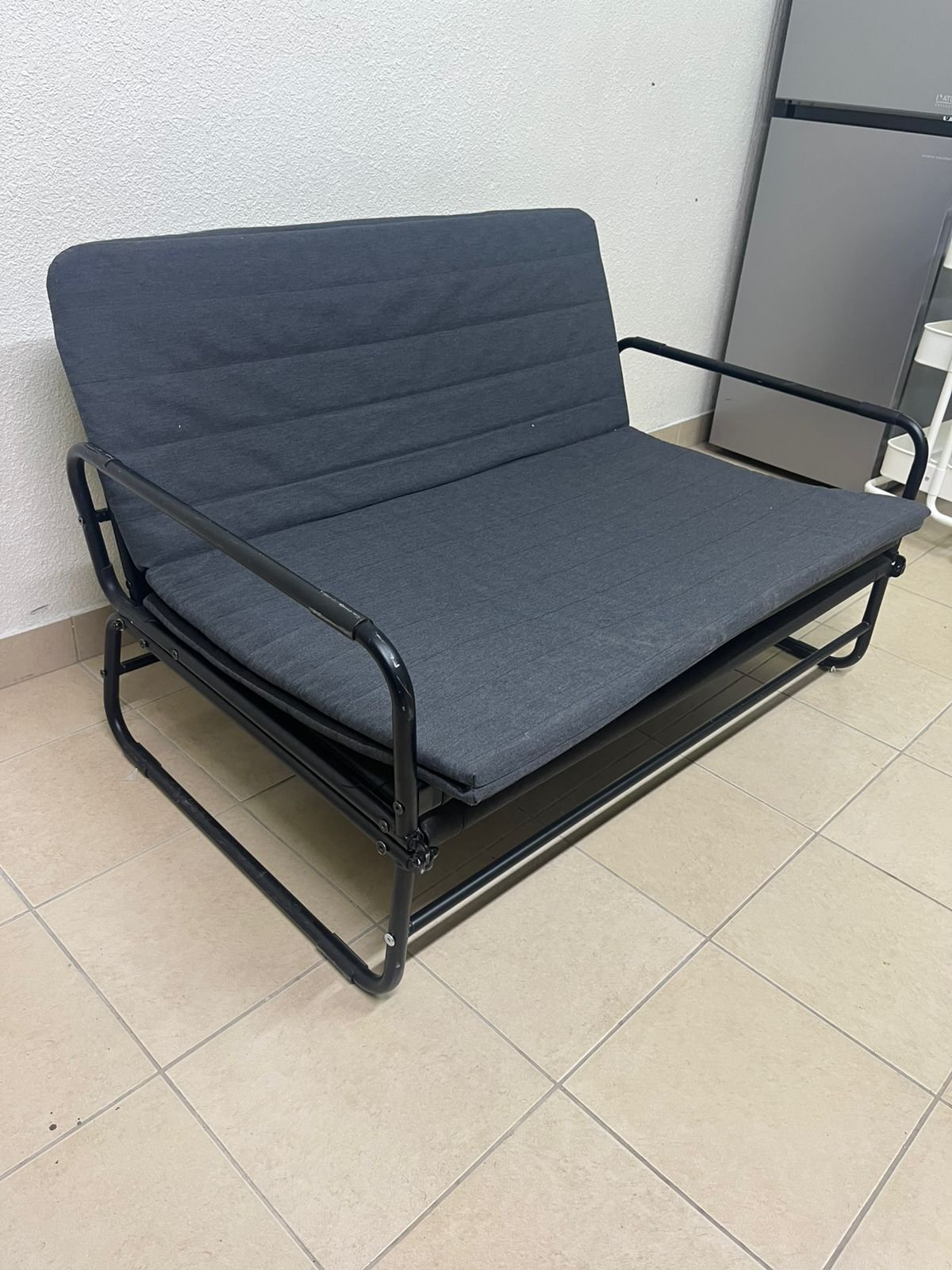 IKEA HAMMARN sofa bed in dark gray.