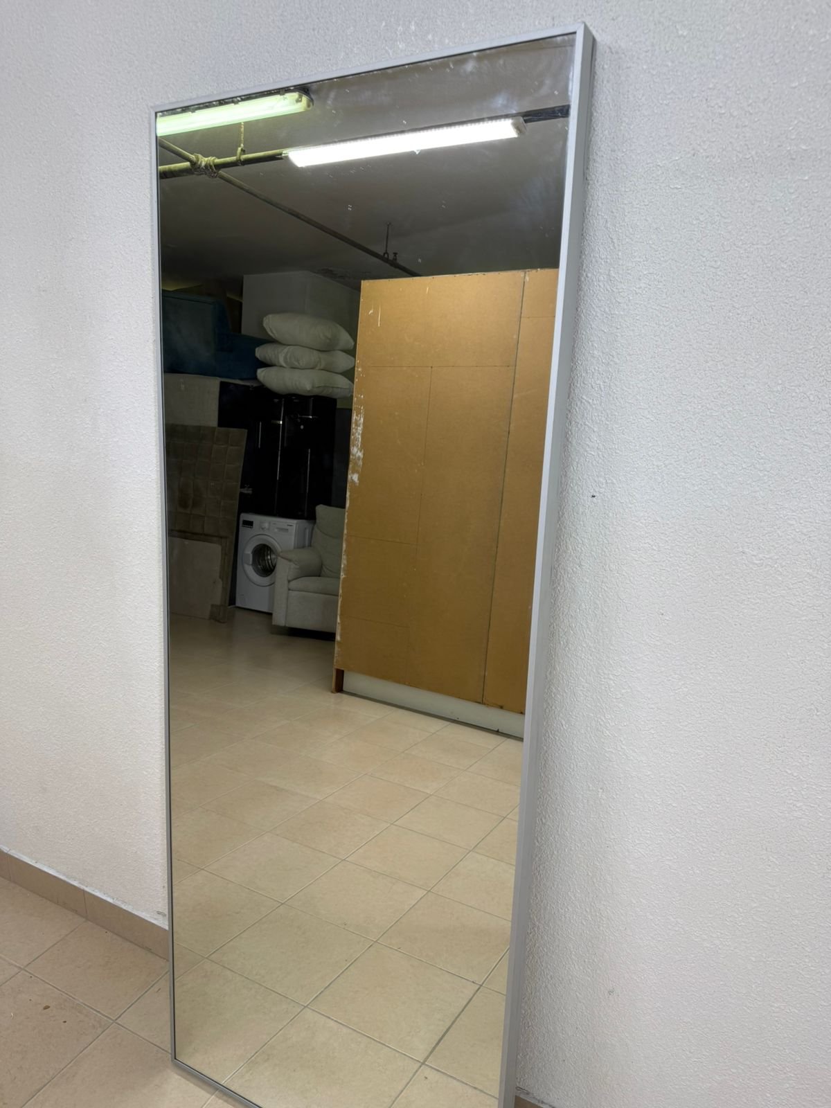 Mirror with a thin silver metal frame