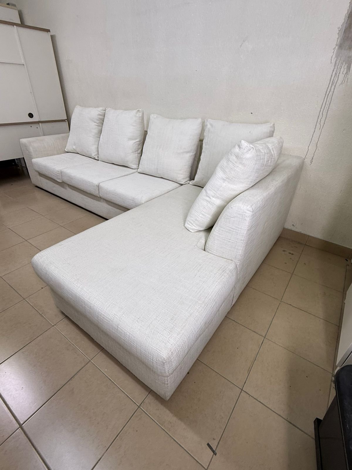 Light-colored sectional (L-shaped) sofa with comfortable back cushions - Image 2