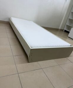 White bed with mattress