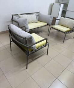 Outdoor furniture with modern touches consisting of a double sofa and two armchairs