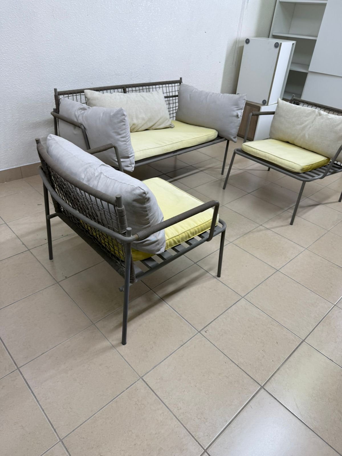 Outdoor furniture with modern touches consisting of a double sofa and two armchairs