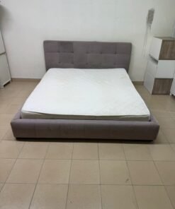 Padded bed with mattress