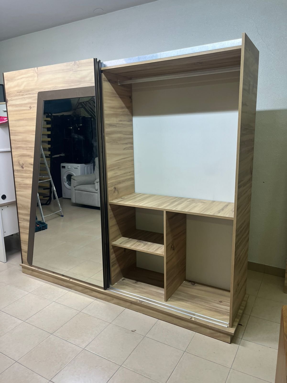 A modern sliding wardrobe combining wood and mirrors - Image 2