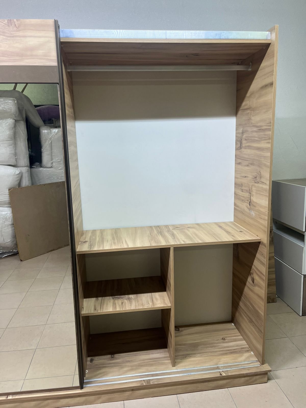 A modern sliding wardrobe combining wood and mirrors - Image 3