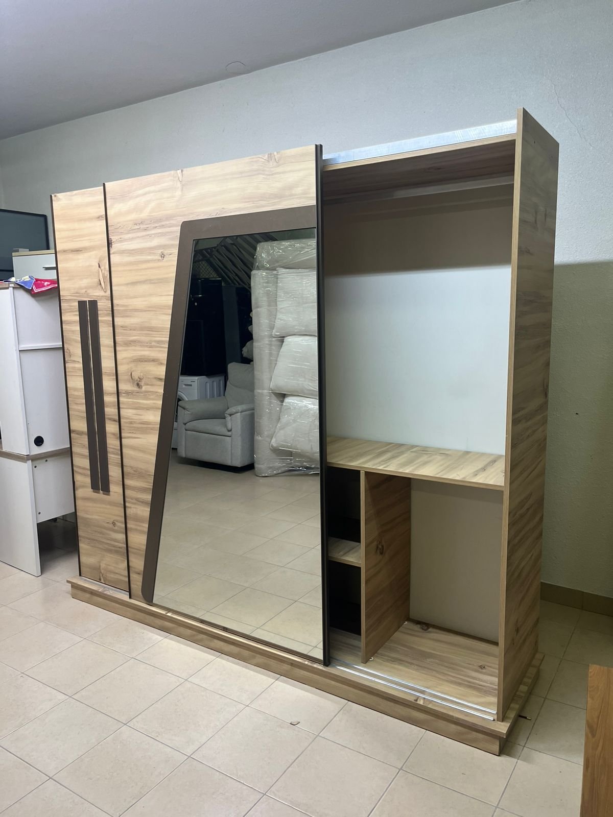 A modern sliding wardrobe combining wood and mirrors - Image 4