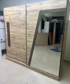 A modern sliding wardrobe combining wood and mirrors