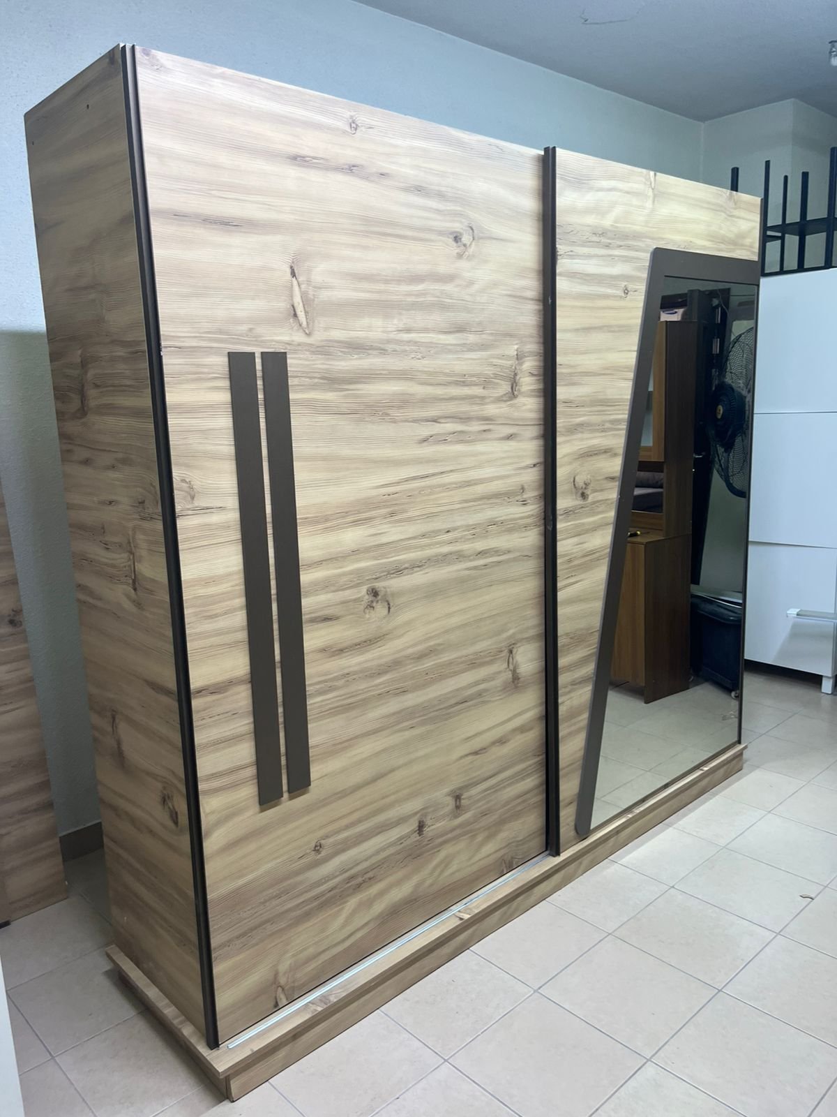 A modern sliding wardrobe combining wood and mirrors - Image 12