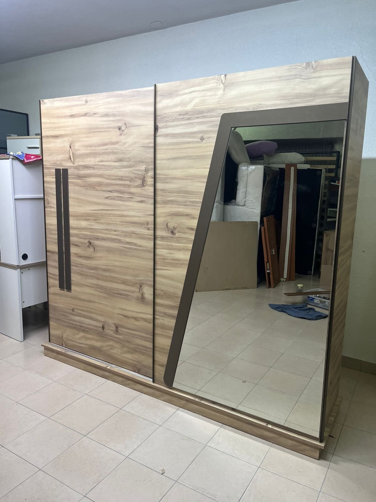 A modern sliding wardrobe combining wood and mirrors - Image 13