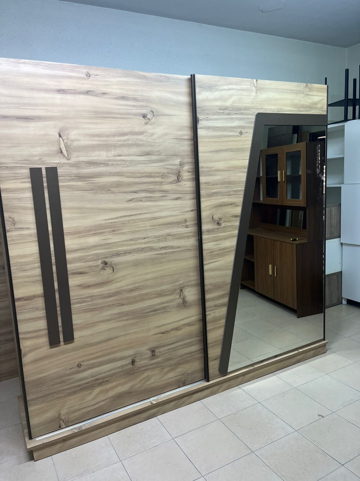 A modern sliding wardrobe combining wood and mirrors - Image 14