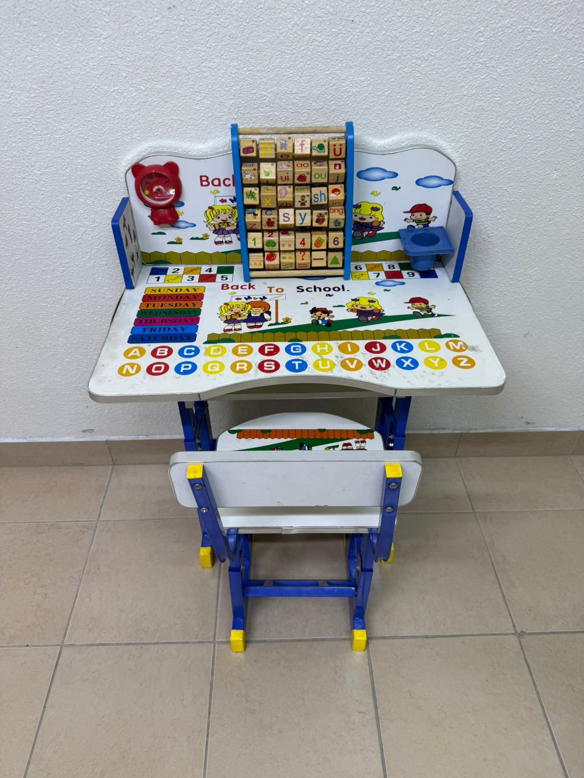 Adjustable children's study table and chair set including educational tools - Image 2