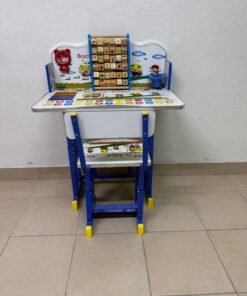 Adjustable children's study table and chair set including educational tools