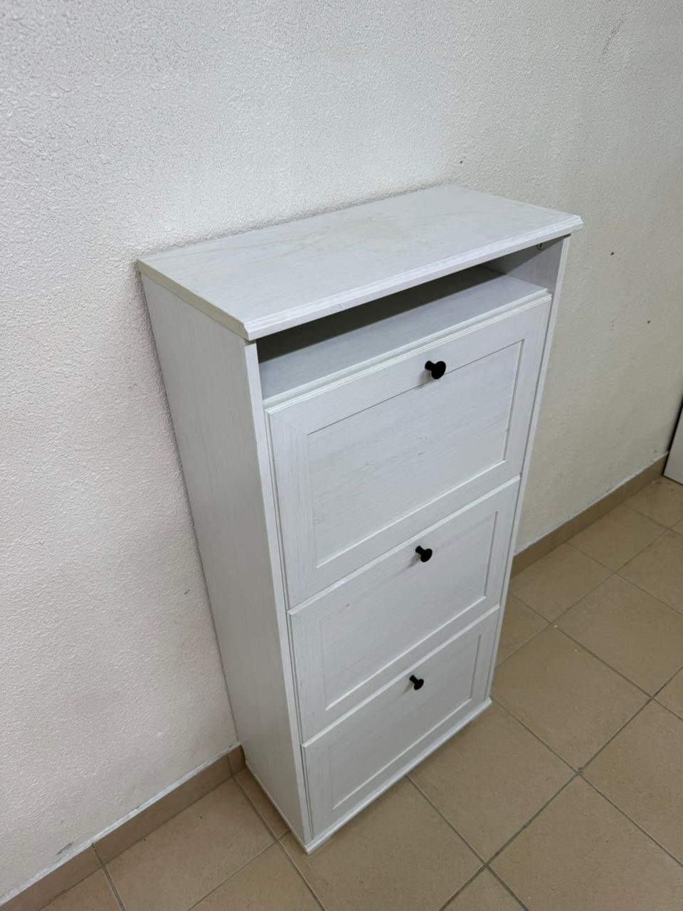 White shoe cabinet with flip-up drawers and small black handles - Image 2