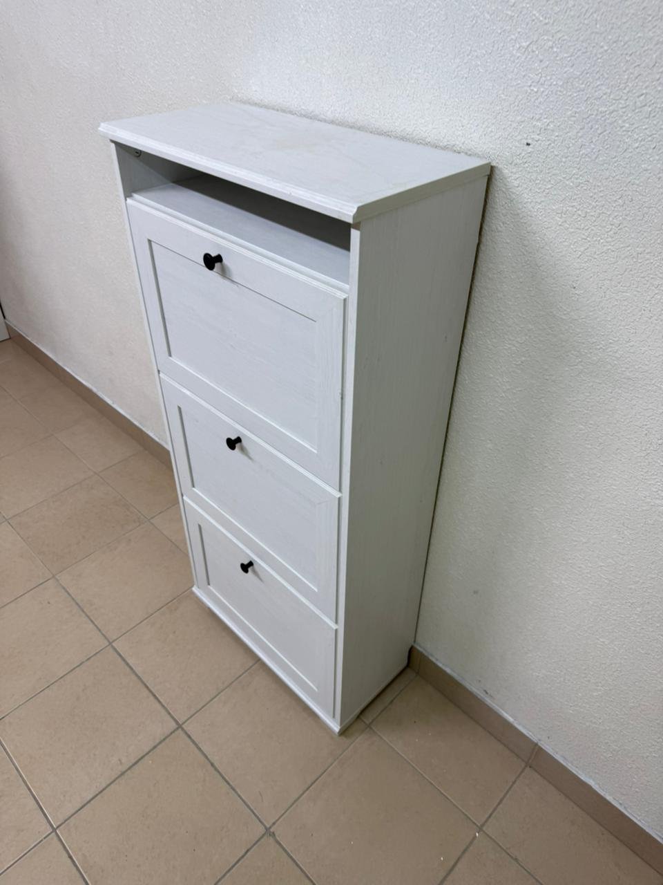 White shoe cabinet with flip-up drawers and small black handles - Image 3
