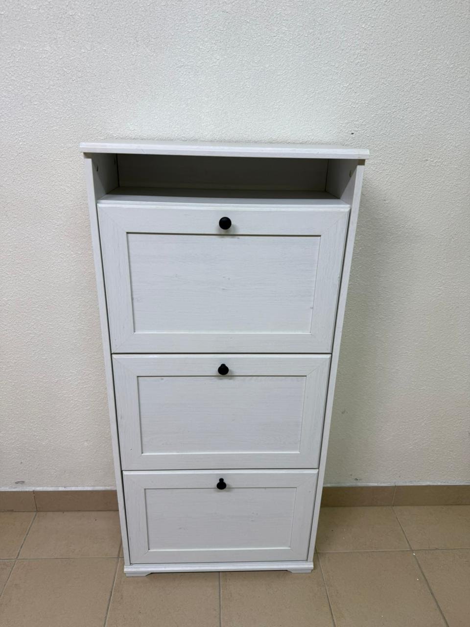 White shoe cabinet with flip-up drawers and small black handles - Image 4