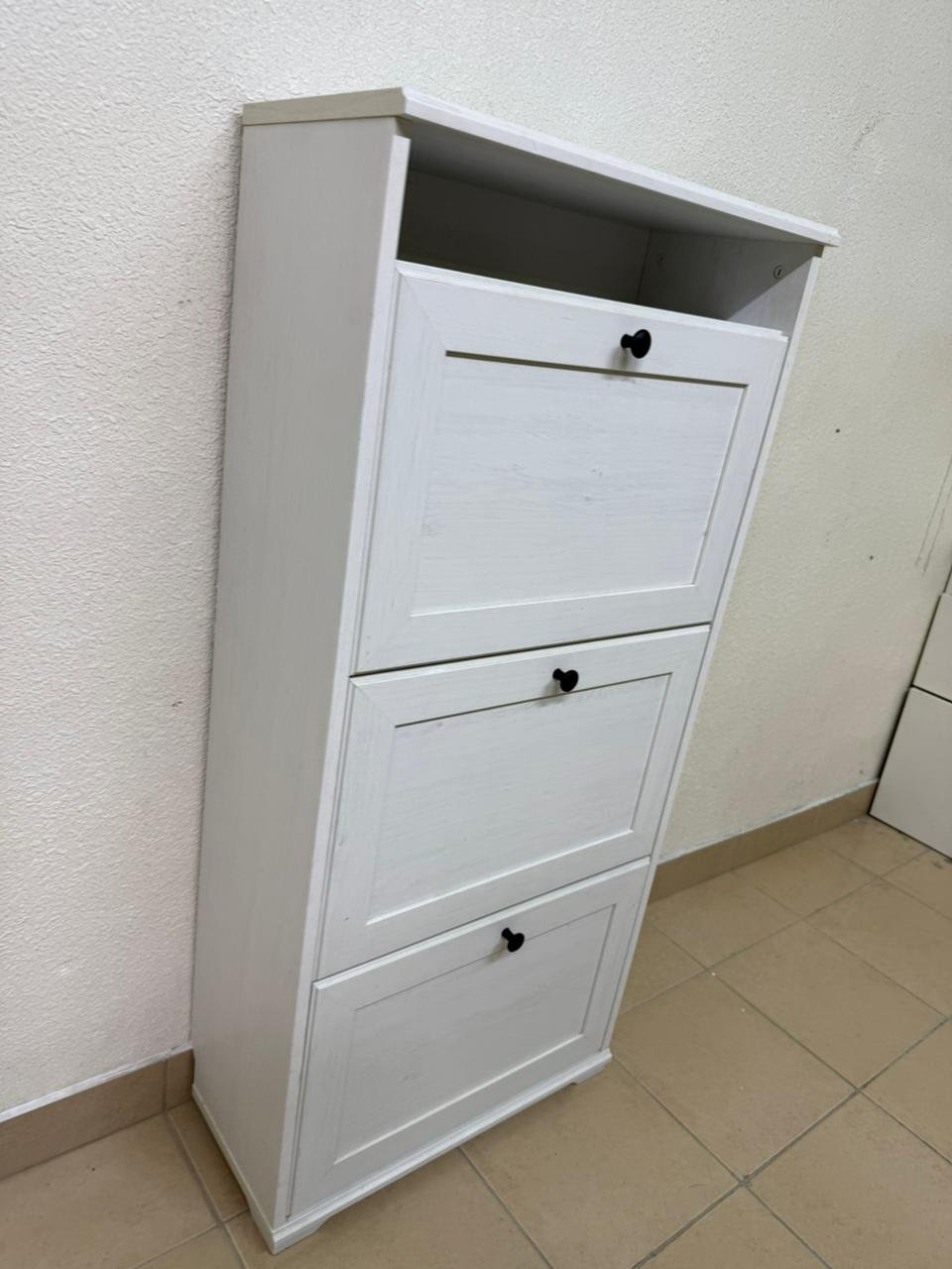 White shoe cabinet with flip-up drawers and small black handles - Image 14