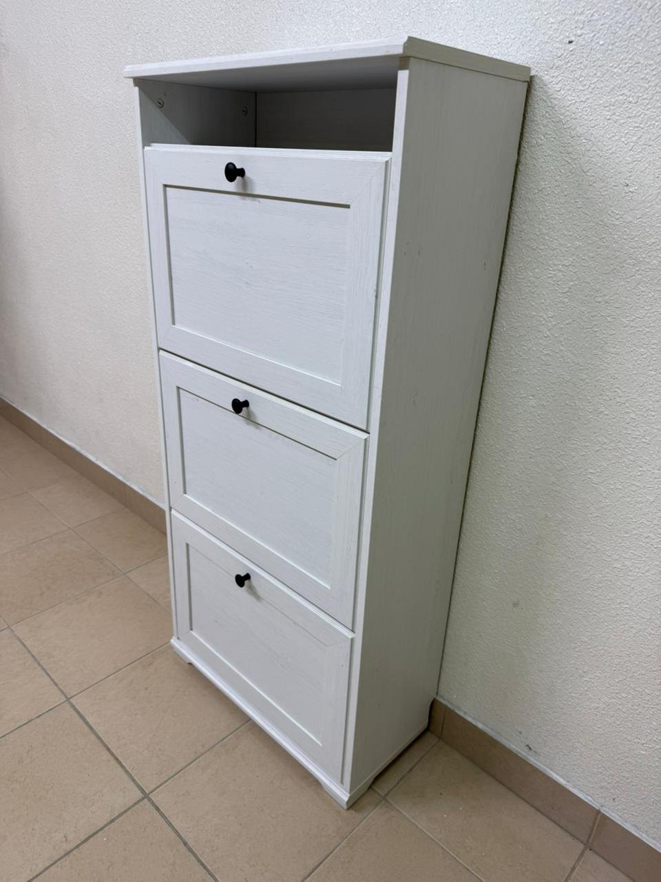 White shoe cabinet with flip-up drawers and small black handles - Image 17