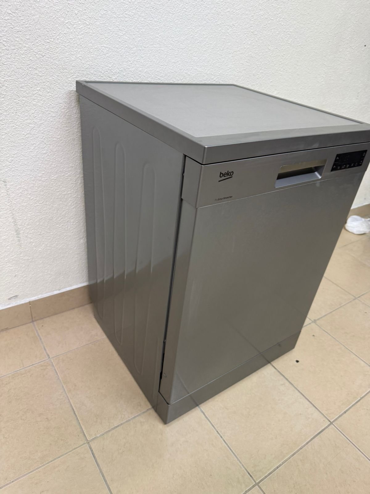 A freestanding dishwasher from Beko, featuring a silver color and modern design. - Image 2