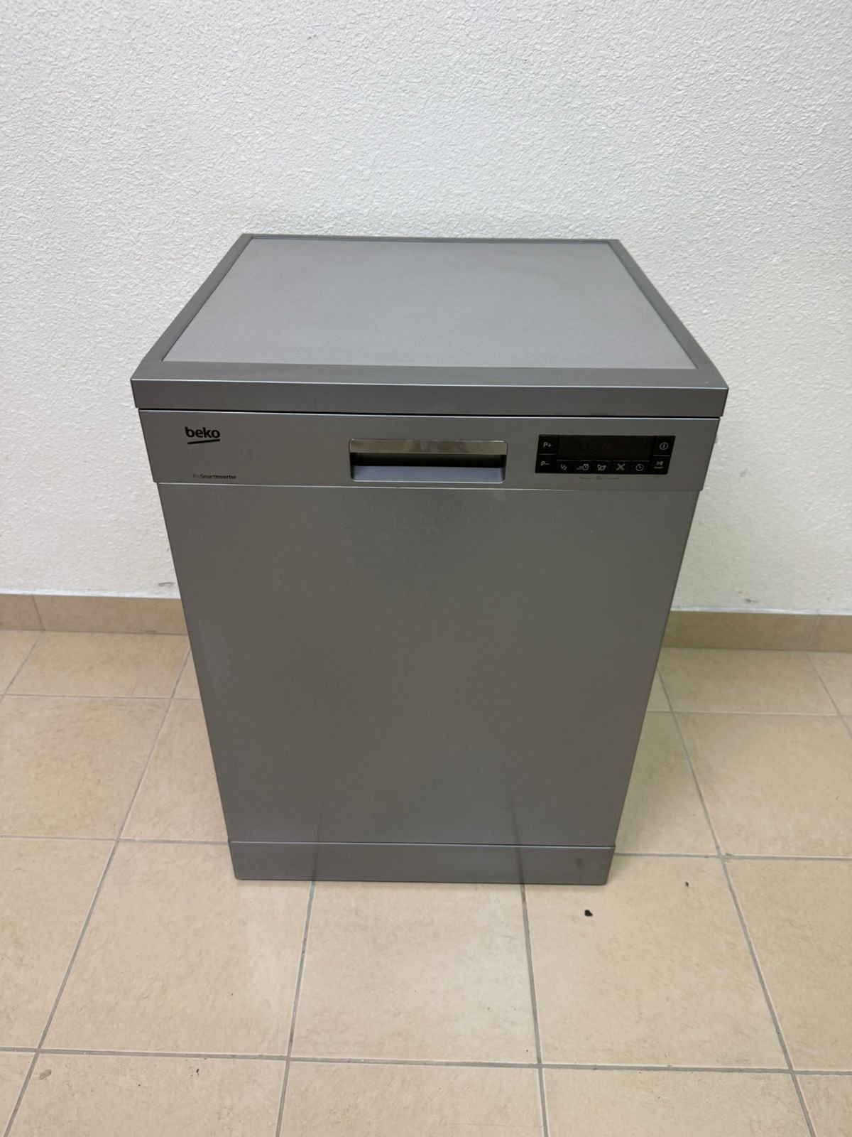 A freestanding dishwasher from Beko, featuring a silver color and modern design. - Image 6