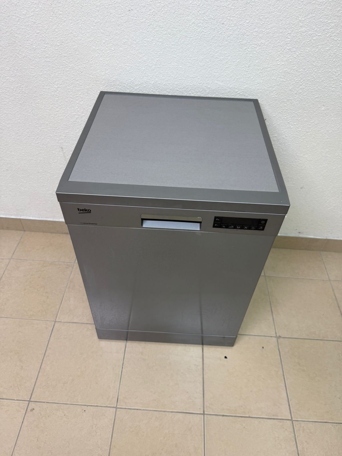 A freestanding dishwasher from Beko, featuring a silver color and modern design. - Image 8