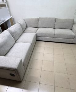 Light gray fabric sofa, intricate corner