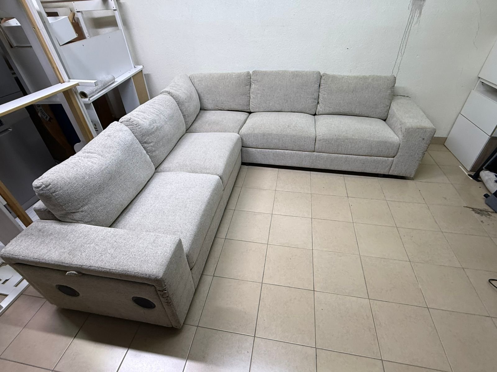 Light gray fabric sofa, intricate corner