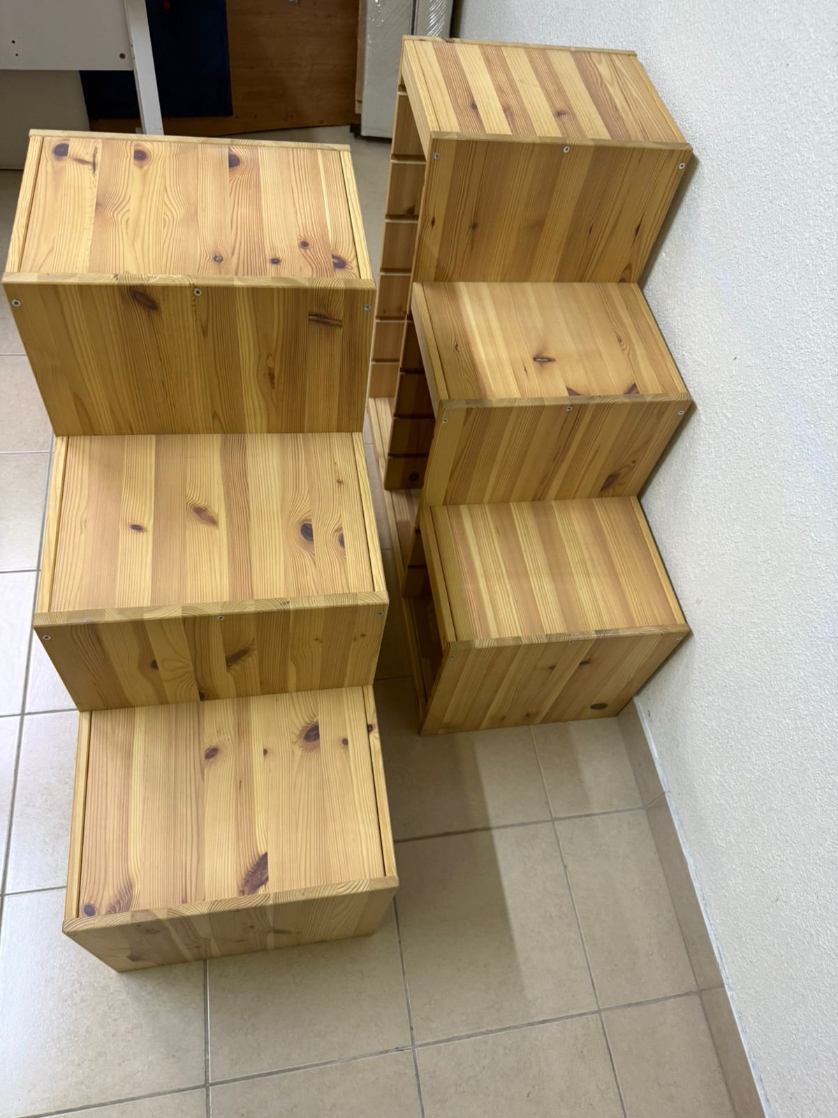 This wooden frame from IKEA is part of the TROFAST storage series and features a stepped design made of pine wood. - Image 9
