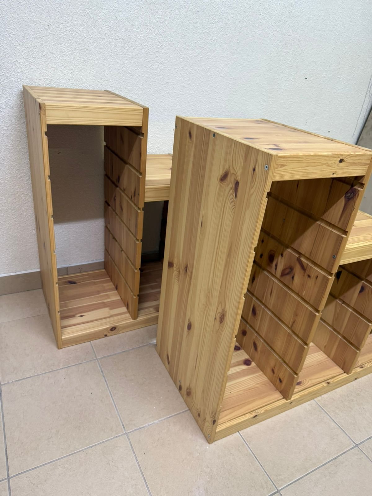 This wooden frame from IKEA is part of the TROFAST storage series and features a stepped design made of pine wood. - Image 10