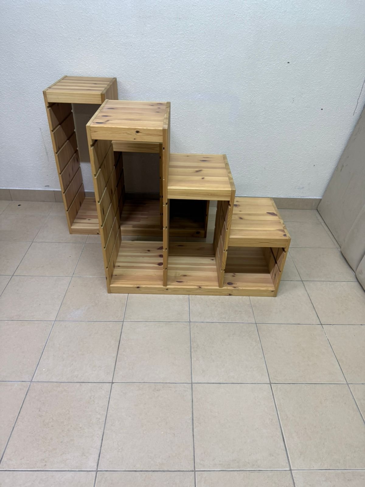 This wooden frame from IKEA is part of the TROFAST storage series and features a stepped design made of pine wood. - Image 8
