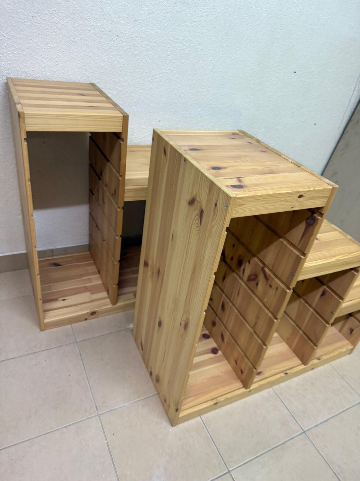 This wooden frame from IKEA is part of the TROFAST storage series and features a stepped design made of pine wood. - Image 5