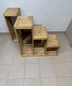 This wooden frame from IKEA is part of the TROFAST storage series and features a stepped design made of pine wood.