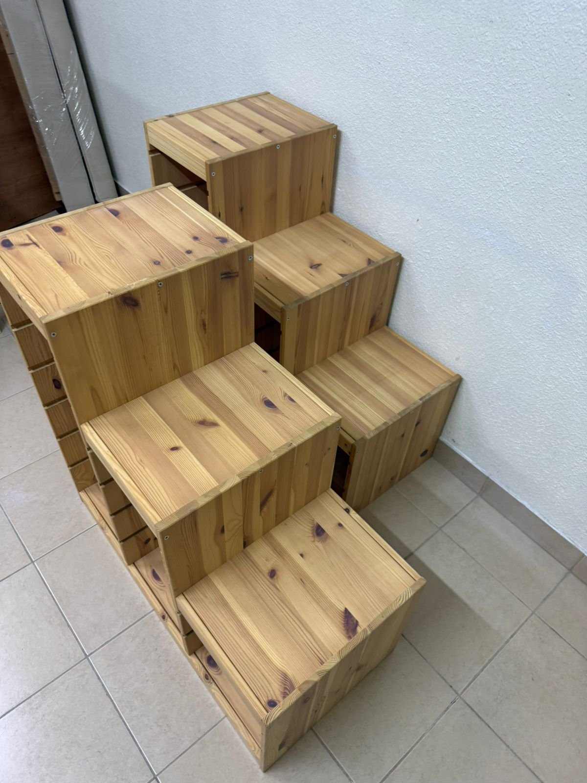This wooden frame from IKEA is part of the TROFAST storage series and features a stepped design made of pine wood. - Image 4