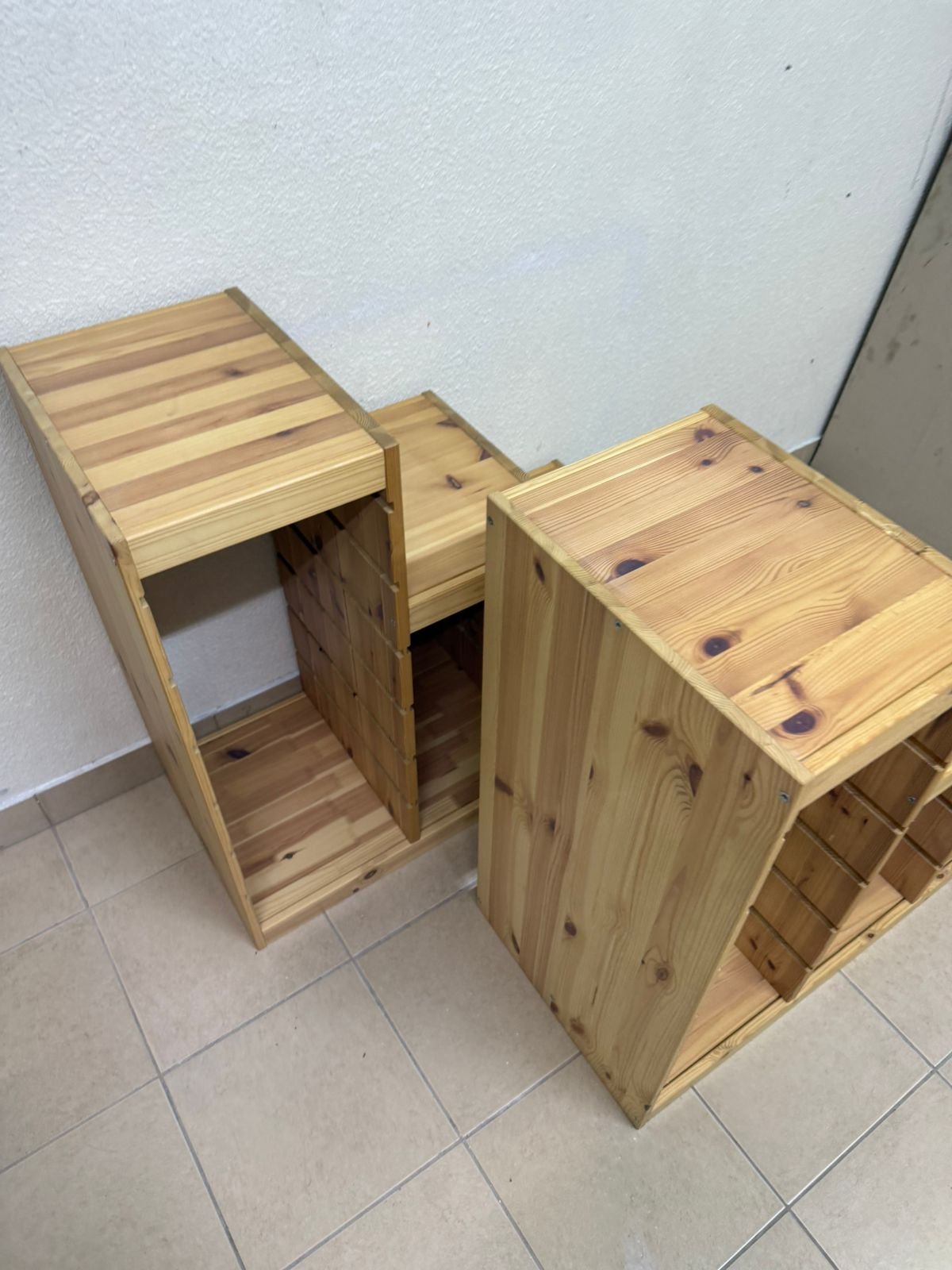 This wooden frame from IKEA is part of the TROFAST storage series and features a stepped design made of pine wood. - Image 2