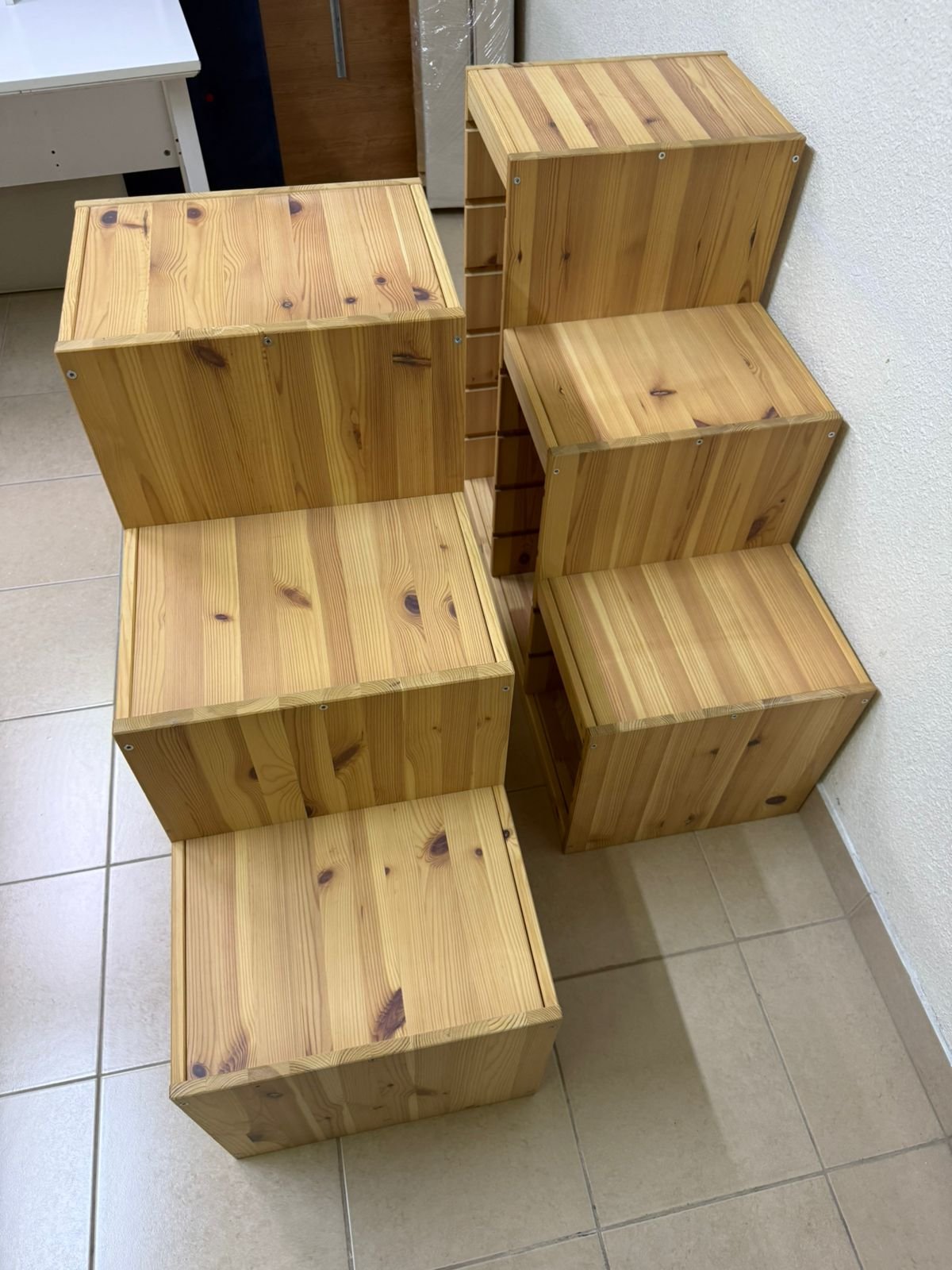 This wooden frame from IKEA is part of the TROFAST storage series and features a stepped design made of pine wood. - Image 12