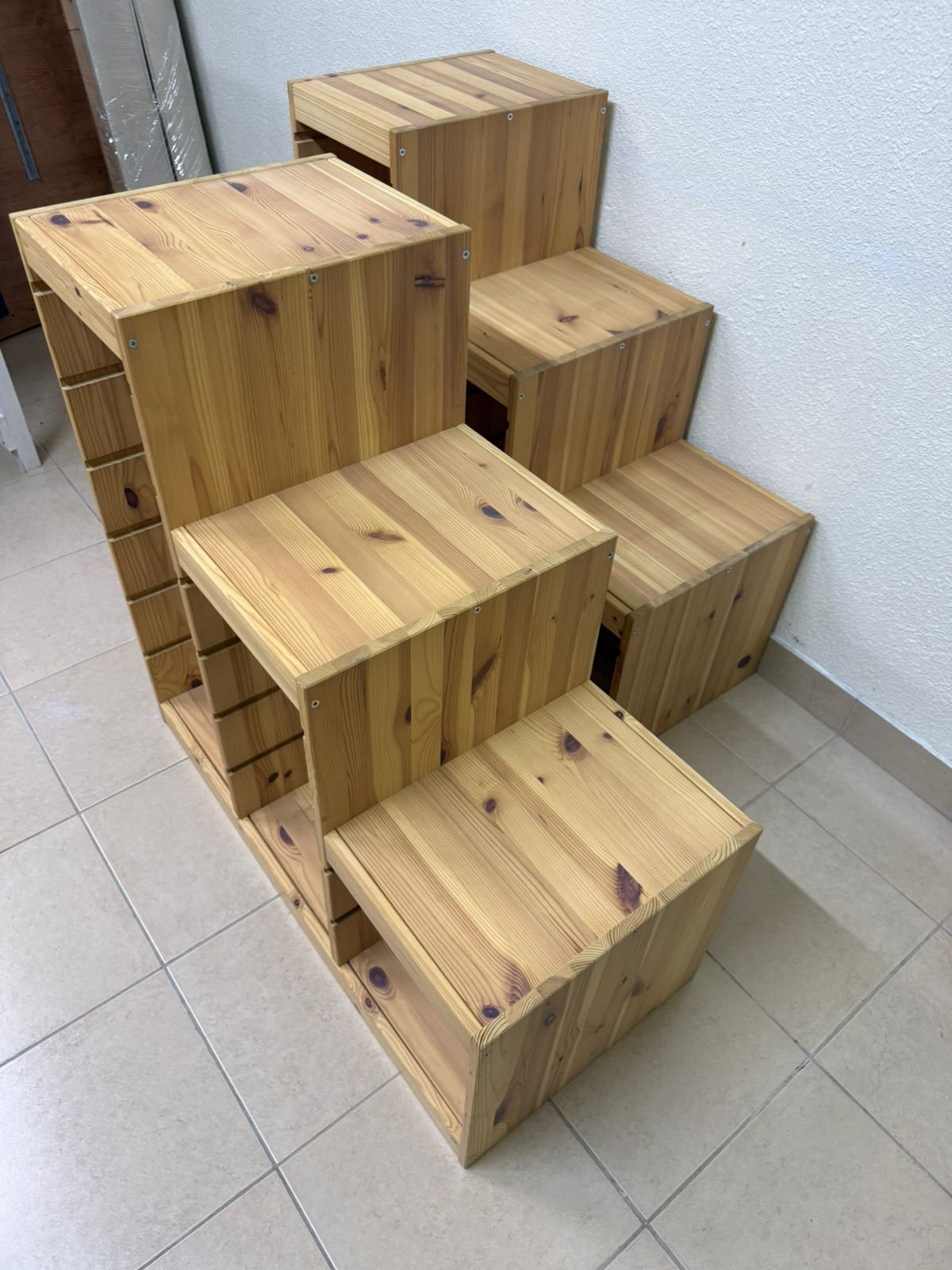 This wooden frame from IKEA is part of the TROFAST storage series and features a stepped design made of pine wood. - Image 11