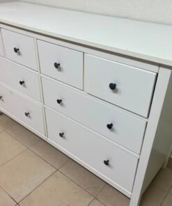 The IKEA HEMNES chest of drawers is white and features eight drawers.