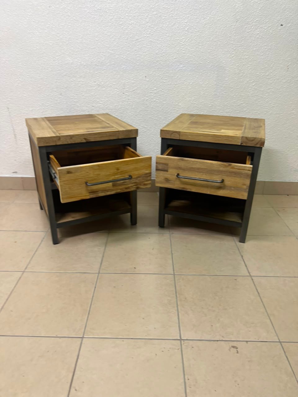 Bedside table with a sturdy dark gray metal frame and natural wood top and drawers - Image 2