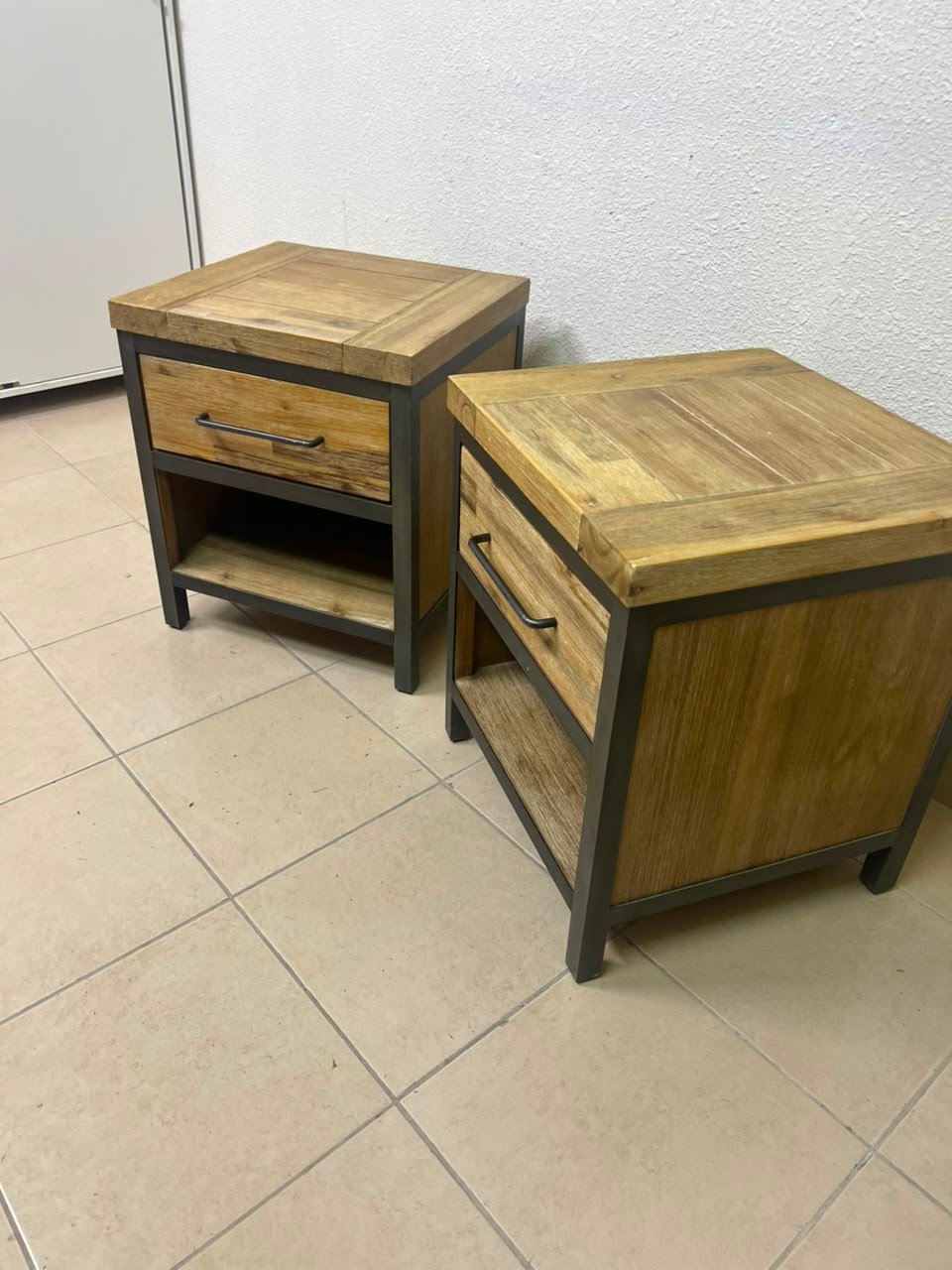 Bedside table with a sturdy dark gray metal frame and natural wood top and drawers - Image 3