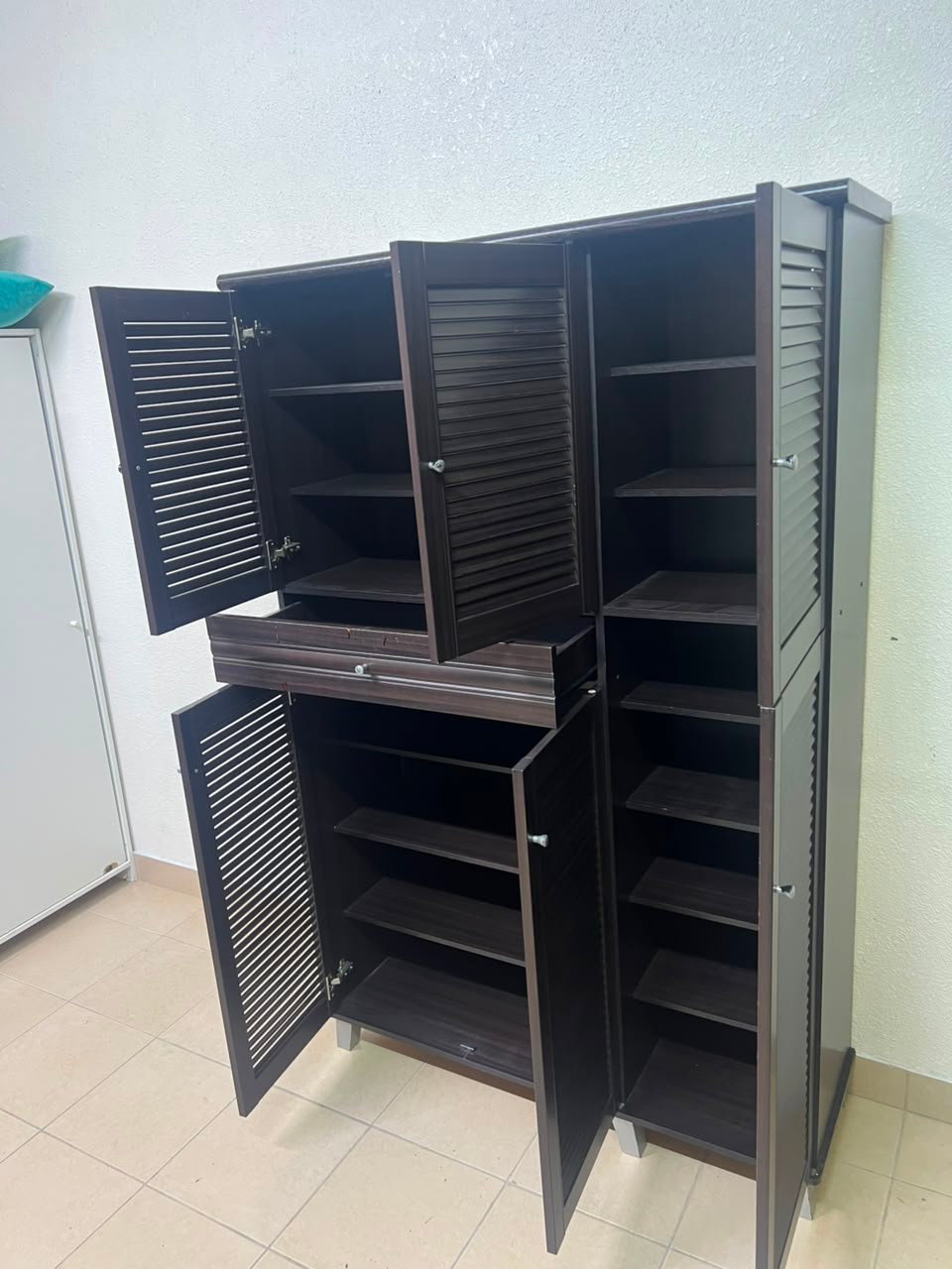 A shoe cabinet with 4 to 6 doors and one drawer in dark brown - Image 11