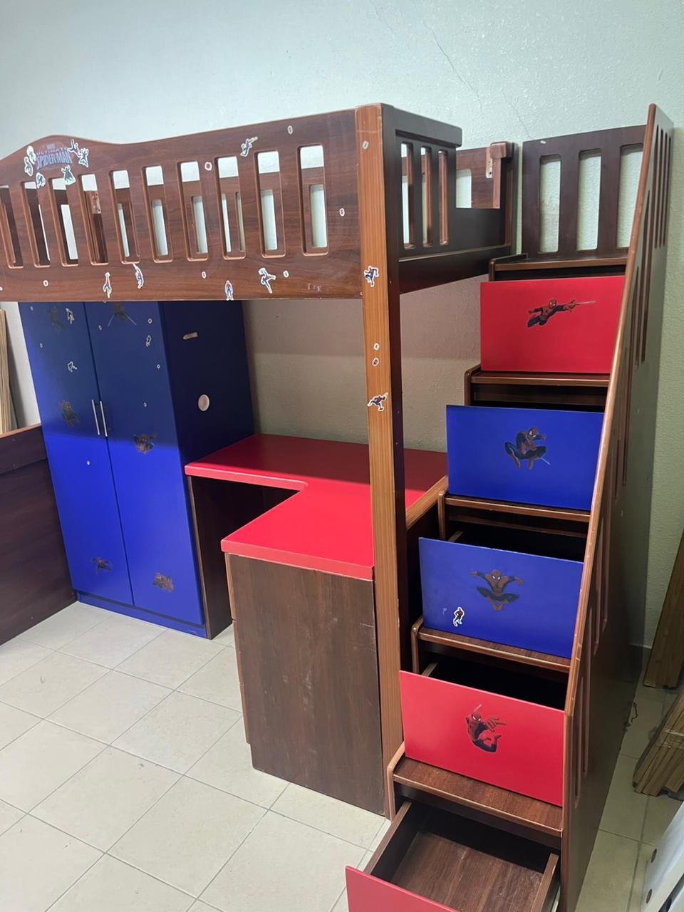 A multi-functional Spider-Man-themed loft bed for children, including a wardrobe, study desk, and stairs with drawers. - Image 8