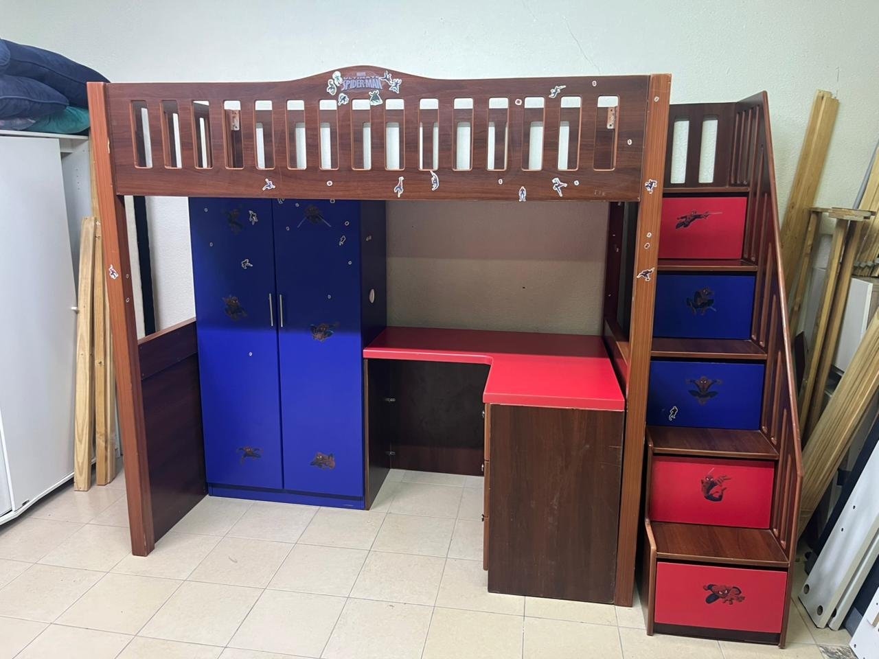 A multi-functional Spider-Man-themed loft bed for children, including a wardrobe, study desk, and stairs with drawers. - Image 5