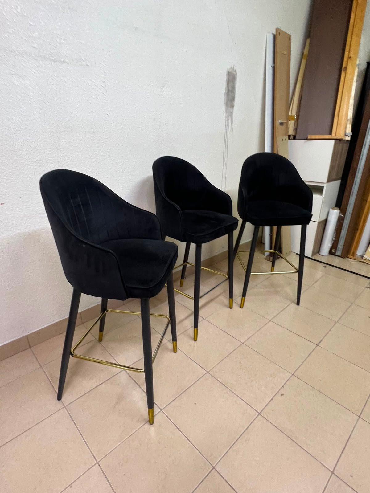 This black velvet bar stool from TUKA features a round design and black legs with gold accents. - Image 8